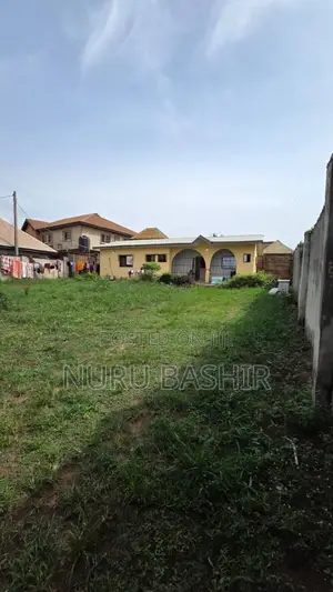 Well Fenced and Gated Plot of Land at Progressive Estate Akala Express