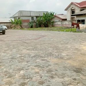 6 Plots Of Land With 8 Flats At Woji Road For Sale