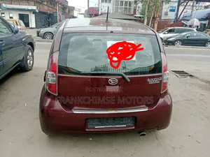 Daihatsu Sirion 2010 Maroon