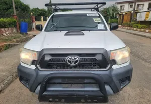 Toyota Tacoma Regular Cab 4x4 2.7L 4-Cyl. 4-Speed Automatic 2013 White