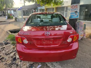 Toyota Corolla LE 4dr Sedan (1.8L 4 cyl 4A) 2009 Red