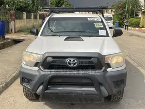Toyota Tacoma Regular Cab 4x4 2.7L 4-Cyl. 5-Speed Manual 2013 White