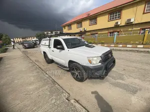 Toyota Tacoma Regular Cab 4x4 2.7L 4-Cyl. 5-Speed Manual 2013 White