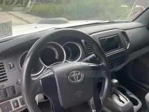 Toyota Tacoma Regular Cab 4x4 2.7L 4-Cyl. 5-Speed Manual 2013 White
