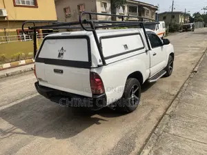 Toyota Tacoma Regular Cab 4x4 2.7L 4-Cyl. 5-Speed Manual 2013 White