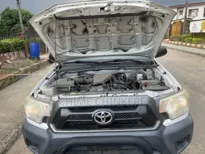 Toyota Tacoma Regular Cab 4x4 2.7L 4-Cyl. 5-Speed Manual 2013 White