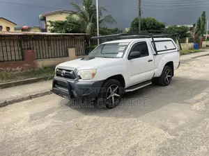 Toyota Tacoma Regular Cab 4x4 2.7L 4-Cyl. 5-Speed Manual 2013 White