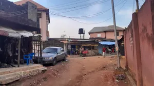 2bedroom Bungalow With 4shops and a Car Space for Sale