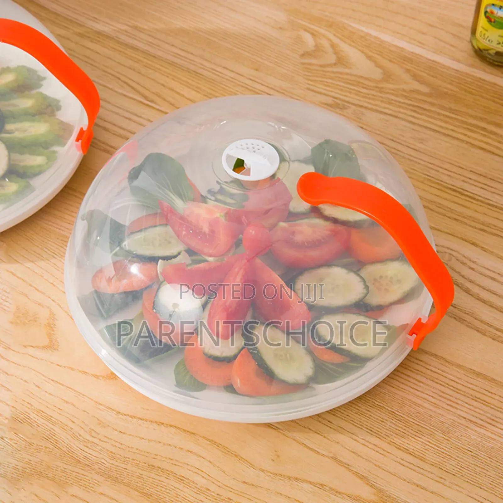 Transparent Microwave Cover With Rotatable Vent