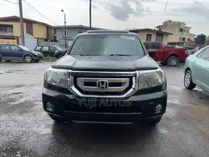 Honda Pilot Touring w/RES/Navi 4WD (3.5L 6cyl 5A) 2010 Black
