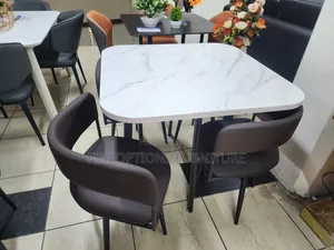 The Ivory Marble Elegance Dining Set