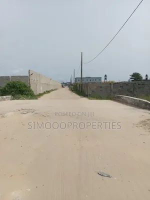 Half Plot of Land for Sale at Onishon, Fenced and Gated