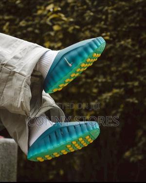 Nike Mind 001 Mules “Geode Teal Light Menta” Now Available in