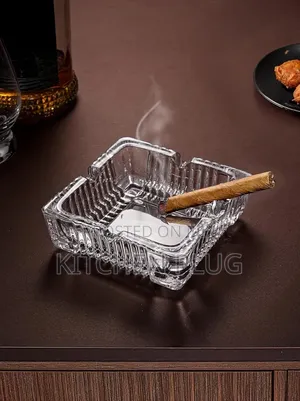 Square, Clear Glass Ashtray For Holding Cigarettes Or Cigars.