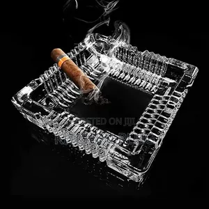 Square, Clear Glass Ashtray For Holding Cigarettes Or Cigars.