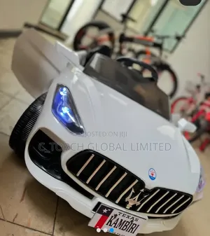 White Maserati-Inspired Electric Ride-on Car for Kids