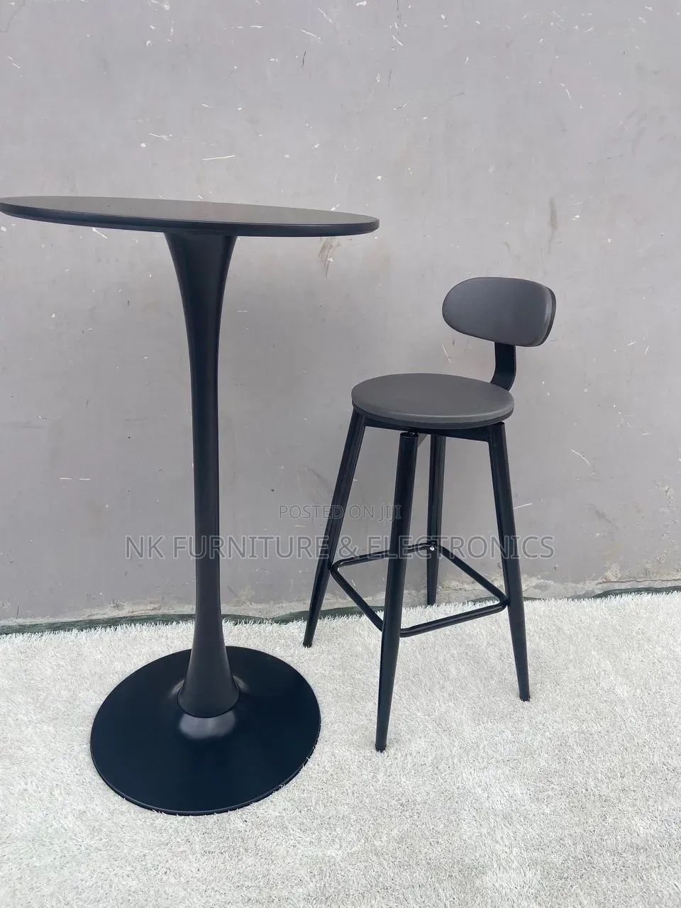 A Set of Bar Table With a Bar Stools Imported