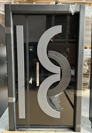 Security Door With a High-Gloss Black Finish Silver Geometric Accent