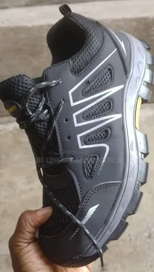 Style Safety Shoe, Likely Designed For Industrial Or Construction Work