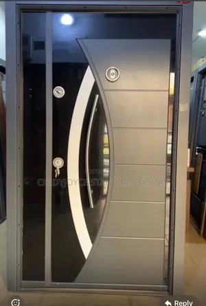 Gray Modern Security Steel Door With a Contrasting White Arc Handle