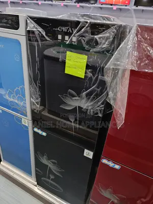 Water Dispenser With a Built-in Refrigerator.