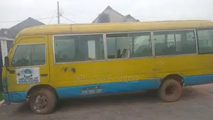 Toyota Coaster 1999 Yellow