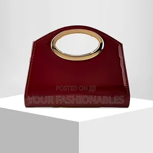Oval Gold Trim Handle Clutch Purse ( Patent)