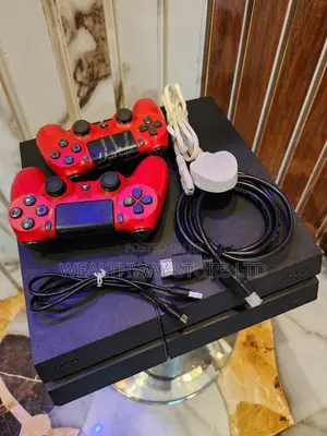 Clean Ps4 Fat Console With 2 Red Pads and All Cables