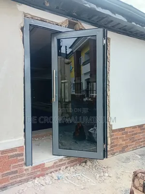 Premium Aluminium Collapsible Door With Dark Glass | Secure Modern