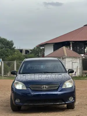 Toyota Matrix Hatchback AWD (1.8L 4cyl 4A) 2006 Blue