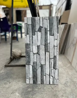 These Tiles Feature Vertical Ribs or Grooves That Create a Tactile,