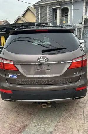 Hyundai Santa Fe Limited w/Saddle Interior 4dr SUV AWD (3.3L 6cyl 6A)