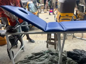 Foldable Examination Couch With Reclining Head Rest