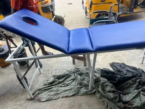 Foldable Examination Couch With Reclining Head Rest