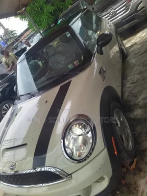 Mini Cooper John Cooper Works 2dr Convertible (1.6L 4cyl Turbo 6M) 2014