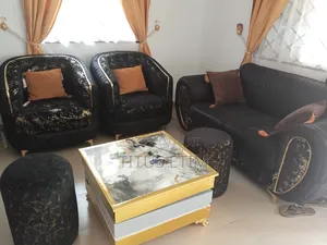 Wall Panel Tv Console and Two Single One Double a Center Table