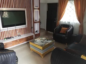 Wall Panel Tv Console and Two Single One Double a Center Table