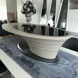 Oval Glass Center Table – Modern Wave Design 