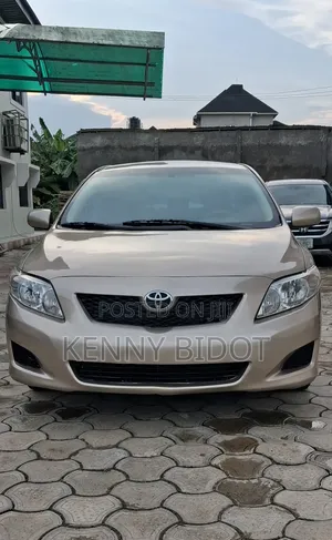 Toyota Corolla LE 4dr Sedan (1.8L 4cyl 4A) 2010 Gold