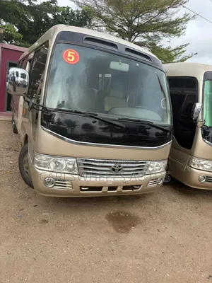 Toyota Coaster 2017 Gold