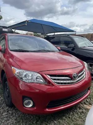 Toyota Corolla L 4dr Sedan (1.8L 4cyl 5M) 2012 Red