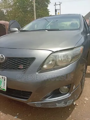 Toyota Corolla Base 4dr Sedan (1.8L 4cyl 5M) 2009 Gray