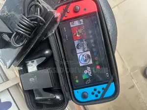 Nintendo Switch Oled With 10 Game Installed Including Fc26