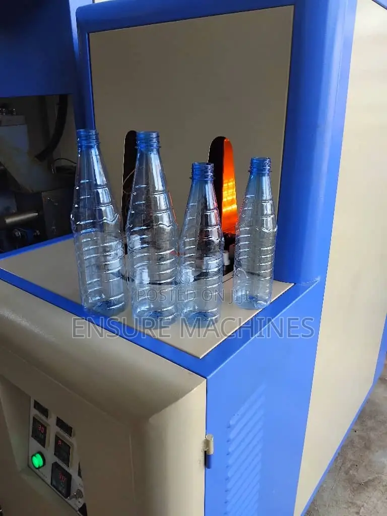 Pet Blowing Machine - Plastic Bottle Making Machine
