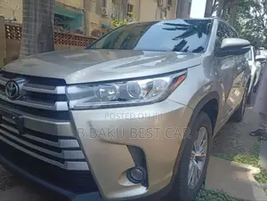 Toyota Highlander XLE 4x2 V6 (3.5L 6cyl 8A) 2018 Gold