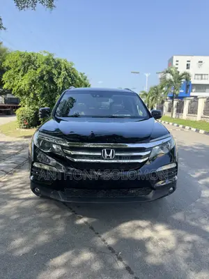 Honda Pilot Touring 4dr SUV 4WD (3.5L 6cyl 9A) 2017 Black