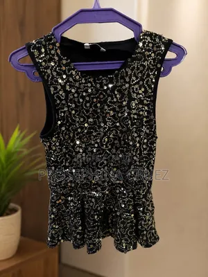 Sequin Peplum Top