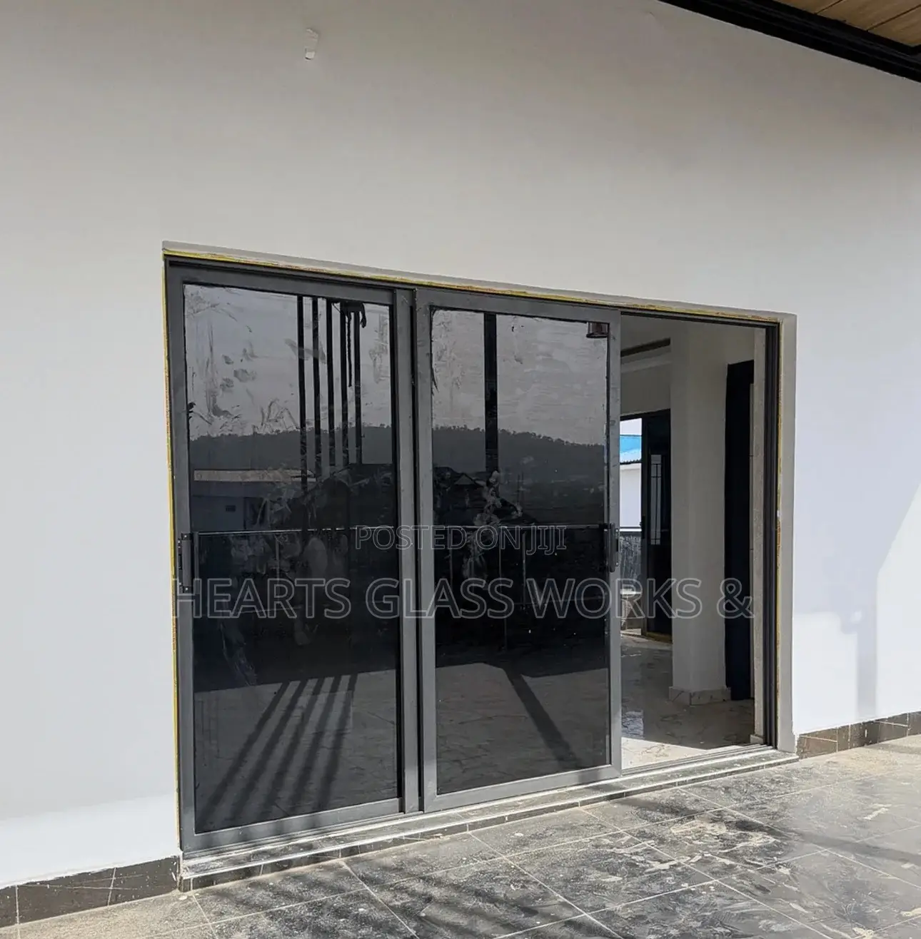 Aluminium Ghana Sliding With Dark Grey Glass