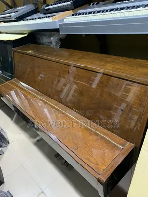 Yamaha Upright Piano ( Super Neat)