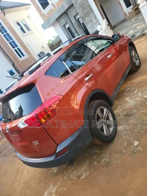 Toyota RAV4 XLE 4dr SUV AWD (2.5L 4cyl 6A) 2015 Orange